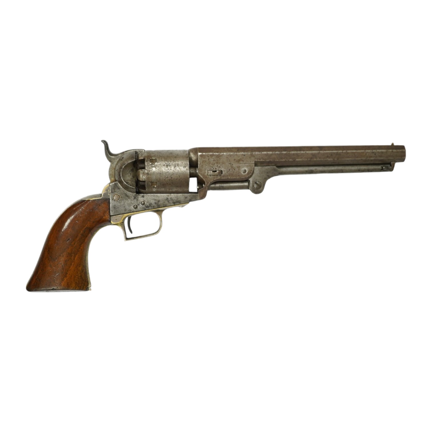 A six shot .36 Colt Navy single action percussion revolver, number 1875 (matching), regulation under lever rammer, signed barrel, roll engraved cylinder, brass mounts with traces of plating and single piece walnut grip,